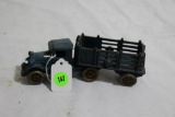 C. to C. C. Co. blue cast iron truck with trailer and tin wheels