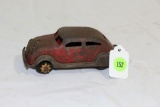 Antique toy Chrysler Air Flow with spinners on wooden wheels (one wheel missing)