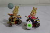 (2) Vintage Japanese tin rabbits riding tricycles
