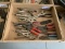 assortment of  vise grips and wire strippers
