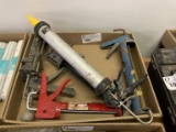 assortment of caulk guns