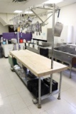 butcher block  prep table with pot rack and draw,