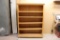 Oak 5 shelf book case on casters