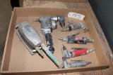 assortment of pneumatic sanders and grinders