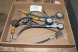 assortment of pressure gauges