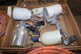 assortment of paint sprayers