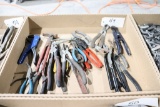 assortment of pliers - needle nose, cutting nippers, combination pliers,