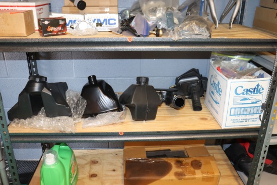 assortment of atv / car parts on shelf