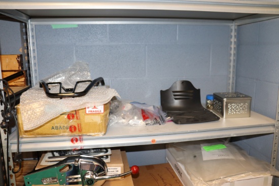 assortment of parts on shelf