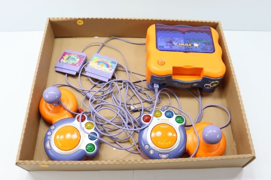 VTech V. Smile with (8) games.