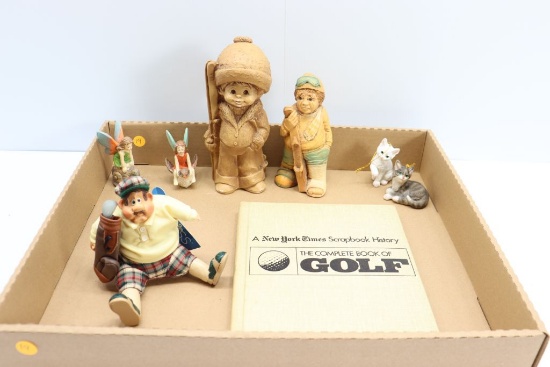 Porcelain figures and book