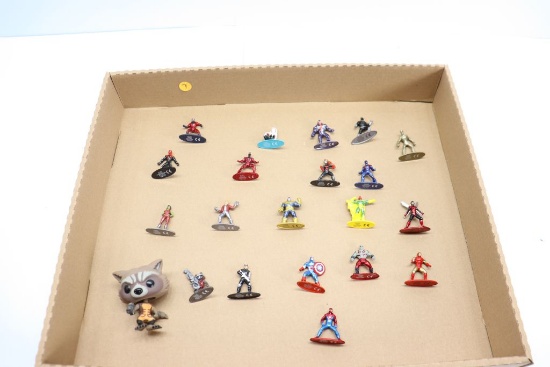 Rocket Raccoon bobble head and Marvel miniatures
