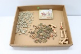 Plastic miniatures and wooden columns
