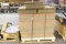 Large assortment of chipboard and boxes