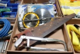 Assortment of saw blades and saws