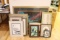 assortment of framed pictures