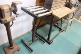 Delta Adjustable rolling Table (basement)
