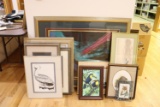 assortment of framed pictures
