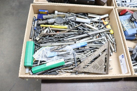Assortment of cutting tools and drill bits
