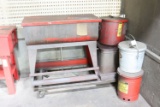 Assortment of oil waste cans and standing rinse tank