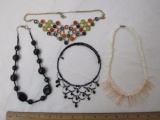 Lot of Women's Costume Jewelry including shell necklace and black acrylic beaded necklace, 6 oz