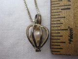 LCC Sterling Silver Caged Pendant on Sterling Chain, both marked 925, 4.6 g total weight