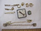 Lot of tie tacks and cuff links including Anson sword, Swank football player, and more