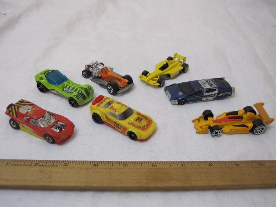 7 Hot Wheels Diecast Cars from 1990s-2010s, see pictures for condition, 8 oz