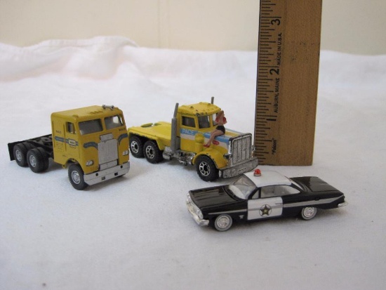 3 Diecast Vehicles including Matchbox Peterbilt Pace Truck and Police Car, 3 oz