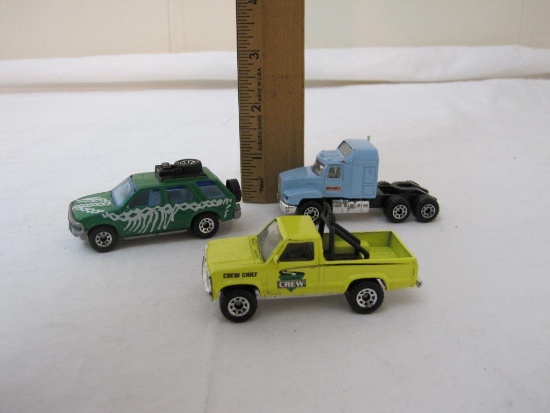 3 Matchbox Diecast Vehicles, 1980s-1990s, including Highway Crew Truck and Brontosaurus, 4 oz