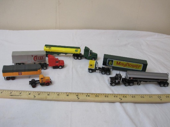 Lot of Miniature Trucks and Trailers including Mayflower, Quaker State, Texaco, and Chief
