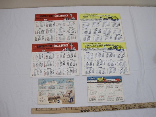 Lot of Santa Fe Year Calendars (2) 1987, (2) 1975, 1963, and 1953, 4 oz