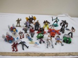 Lot of Misc Toys and Action Figures including Smurfs, Kofi, Archer, and more, 2 lbs 9 oz