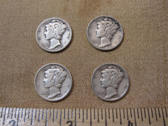 Four silver dimes, one 1935, two 1941 and one 1942, .34 oz