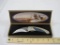 7 3/4 inch knife with Native American theme, in original box, 11 oz