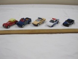 5 Diecast, four Emergency vehicles, Matchbox and Golden, and one Majorette Car, 9 oz