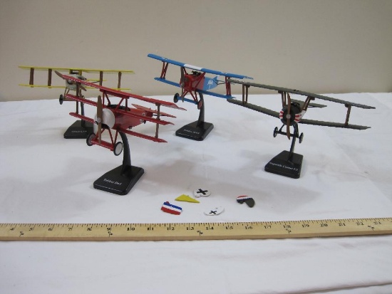 FOUR Plastic Model Airplanes from New Ray with display stands including Fokker D.VII, SPAD S. VII,