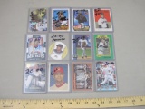 12 Premium Baseball Cards from various brands and years, many higher value cards including Rafael