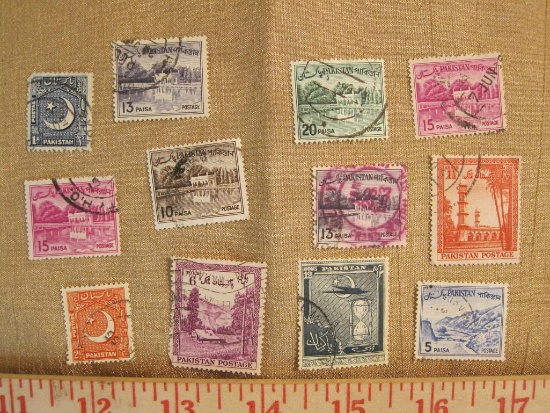Lot of 12 Pakistan postage stamps, all canceled