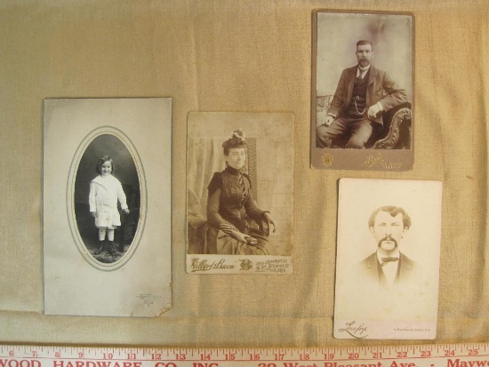 Three vintage portrait cards and one photo of a young boy