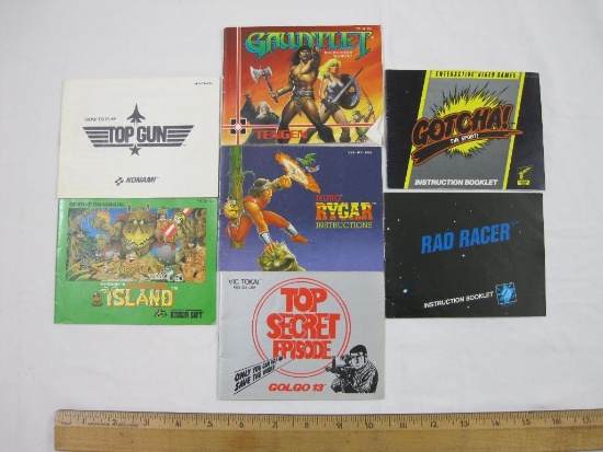 SEVEN Nintendo Game Instruction Booklets including Top Gun, Hudson's Adventure Island, Gauntlet,