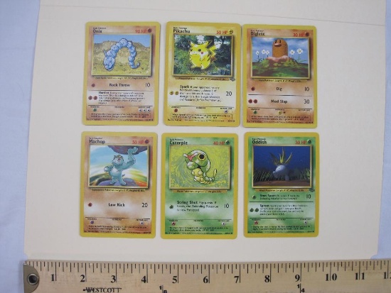 SIX Pokemon Trading Cards including Pikachu, Onix, Diglett, Oddish, Caterpie, and Machop, 1999