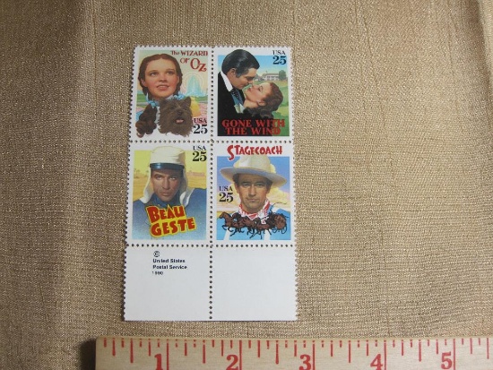 Block of 4 1990 25 cent US postage stamps featuring classic movies "Wizard of Oz," "Gone With the
