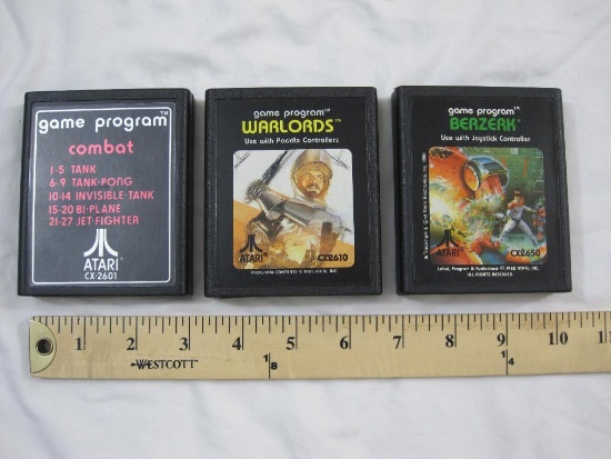 THREE Vintage ATARI 2600 Games including 01 Combat, Berzerk, and Warlords, games have been tested