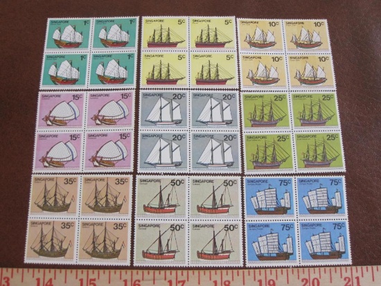 Lot of thirty-six Singapore ship postage stamps in blocks of four, gum is mint