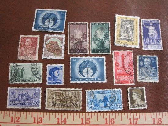 Lot of canceled Italy postage stamps depicting saints, scenes and more