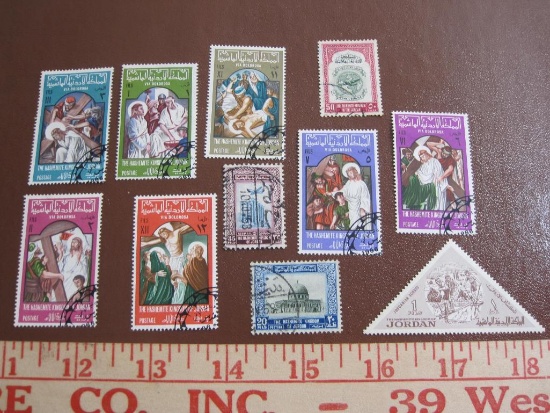 Lot of Jordan postage stamps, all but one canceled. Some depict scenes from Christ's Way of the