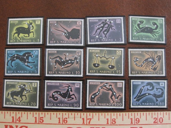 Lot of twelve Republic of San Marino Zodiac postage stamps in mounts, gum is mint