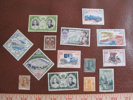 Monaco postage stamp lot. Many are unused and two commemorate the 1956 wedding of Grace Kelly and