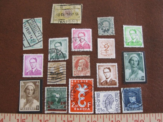 Lot of approximately a dozen cancelled Belgian postage stamps